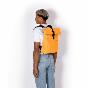 Ucon Acrobatics Lotus Jasper Mini Backpack Amber model man