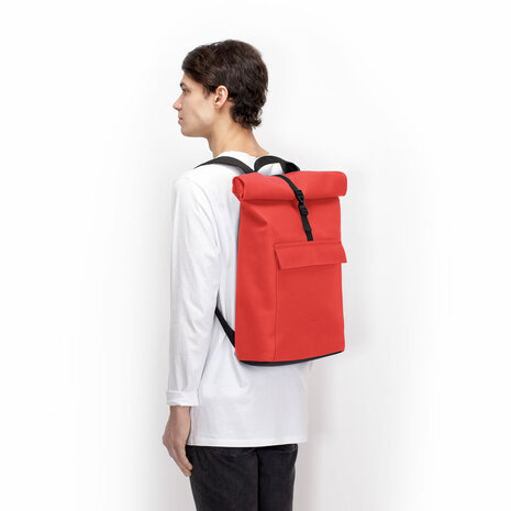 Ucon Acrobatics Lotus Jasper Medium Backpack Red model man