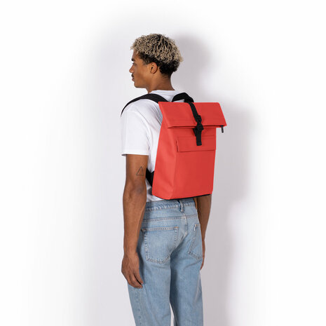 Ucon Acrobatics Lotus Jasper Mini Backpack Red model man